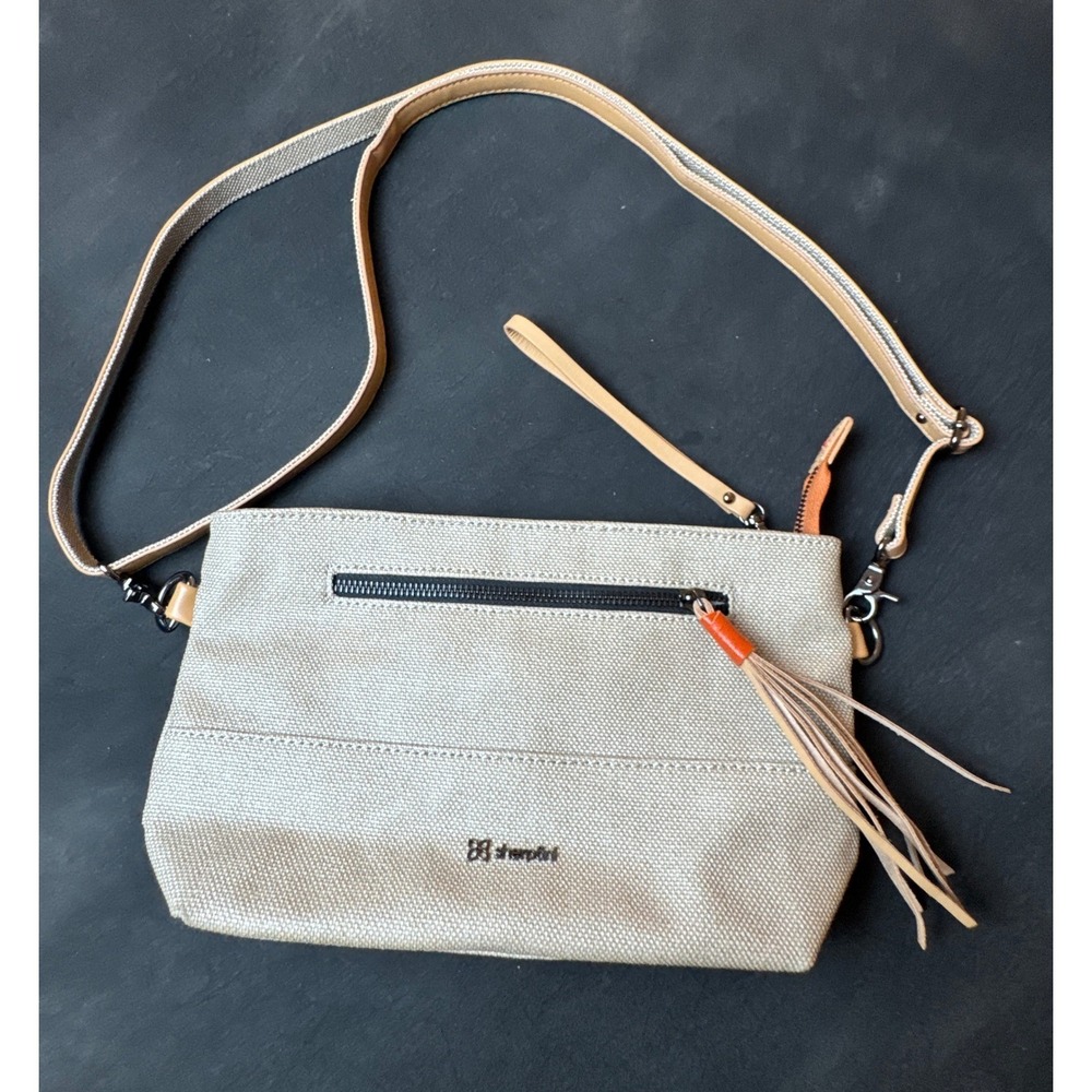 Sherpani Paige Crossbody Bag Tan Canvas Wristlet Handbag Minimalist Travel Small
